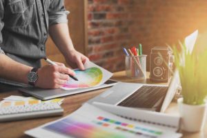 Graphic Designer with Color Swatches